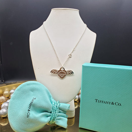 Tiffany & Co. Angel wing heart pendant.